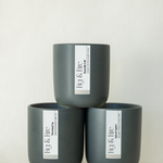 The entire fall collection is featured - Basically Fall, Morning Fog, and Spiced Apples - the vessels are charcoal ceramic tumblers - all-natural, vegan, soy candles made with essential oils