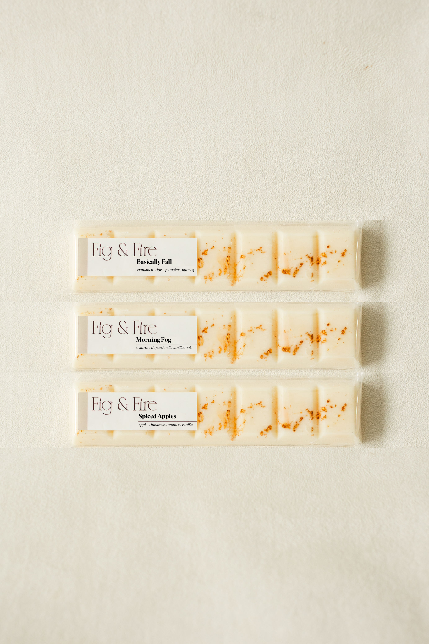 The entire fall collection is featured - Basically Fall, Morning Fog, and Spiced Apples - all-natural, vegan, soy wax melts made with essential oils