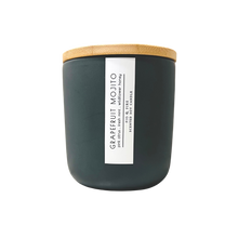 Load image into Gallery viewer, Handcrafted candle - scent is Grapefruit Mojito - smells of pink citrus, fresh mint, and wildflower honey - all natural soy candle - vegan, non-toxic, made with essential oils - container is a charcoal ceramic tumbler with a bamboo wooden lid