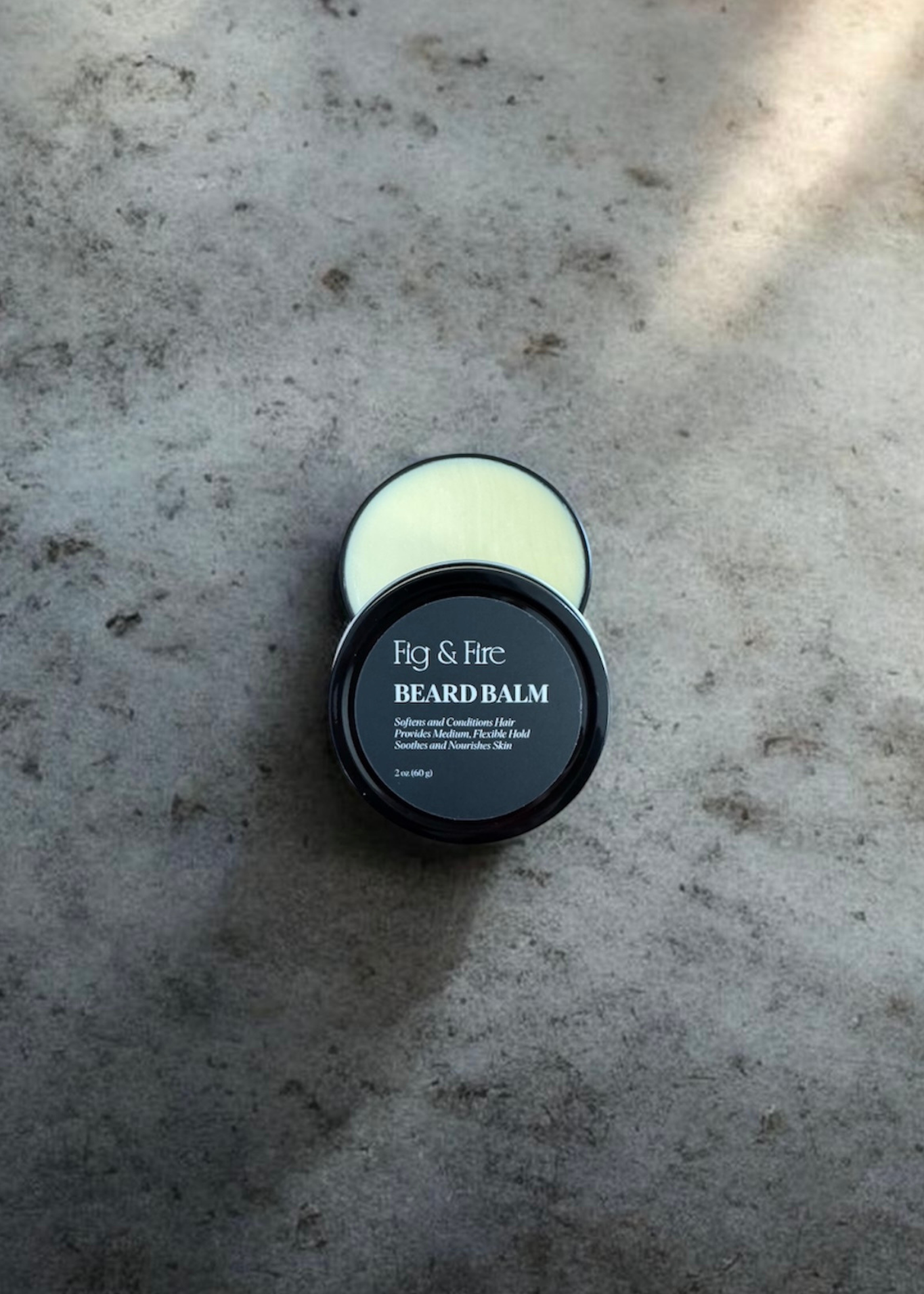 Beard Balm on a stone countertop
