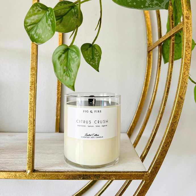 Handcrafted candle - scent is Citrus Crush - smells of mandarin, lemon, lime, and agave - all natural soy candle - vegan, non-toxic, made with essential oils - container is a clear glass tumbler