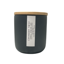 Load image into Gallery viewer, Handcrafted fall candle - scent is Cranberry Twist - smells of cranberry, orange peel, and apple - all natural soy candle - vegan, non-toxic, made with essential oils - container is a charcoal ceramic tumbler with light brown wooden lid from bamboo