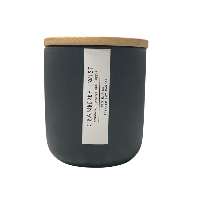 Handcrafted fall candle - scent is Cranberry Twist - smells of cranberry, orange peel, and apple - all natural soy candle - vegan, non-toxic, made with essential oils - container is a charcoal ceramic tumbler with light brown wooden lid from bamboo
