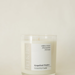 Handcrafted candle - scent is Grapefruit Mojito - scent notes are wildflower honey, pink grapefruit, and fresh mint - all natural soy candle - vegan, non-toxic, made with essential oils - container is a clear glass tumbler