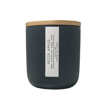 Load image into Gallery viewer, Handcrafted fall candle - scent is Spiced Apples - smells of apple, cinnamon stick, nutmeg, and vanilla - all natural soy candle - vegan, non-toxic, made with essential oils - container is a charcoal ceramic tumbler with light brown wooden lid from bamboo