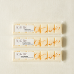 The entire spring collection is featured - Citrus Crush, Grapefruit Mojito, Sweet Sunshine - breakable wax melt bars - all-natural, vegan, non-toxic soy wax melts made with essential oils