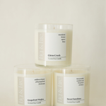 The entire spring collection is featured - Citrus Crush, Grapefruit Mojito, Sweet Sunshine - the vessels are clear glass tumblers - all-natural, vegan, non-toxic soy candles made with essential oils