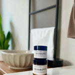 Two jars of Restorative Tallow Balm on a counter. Tallow Balm is made with organic, grass-fed, and pasture-raised tallow. Baby balm. Suitable for all ages.