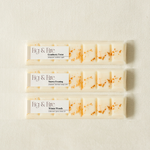 The entire winter collection is featured - Cranberry Twist, Snowy Evening, and Winter Woods - all-natural, vegan, soy wax melts made with essential oils