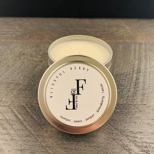 Handcrafted candle - summer seasonal collection - scent is Blissful Berry - smells of currant, cassis, juniper, gooseberry, and lemon - all natural soy candle - vegan, non-toxic, made with essential oils - container is a silver tin