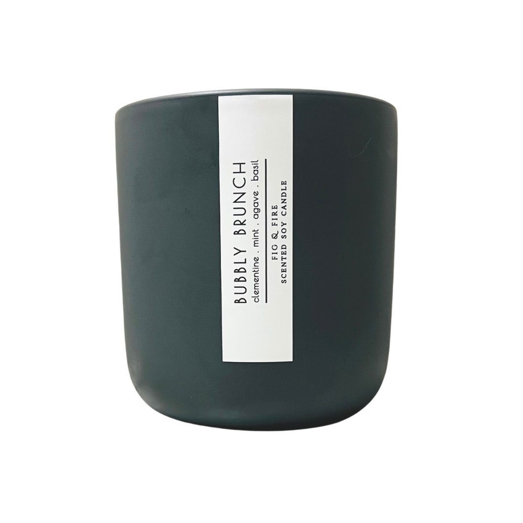 Handcrafted candle - summer seasonal collection - scent is Blissful Berry - smells of clementine, mint, agave, and basil - all natural soy candle - vegan, non-toxic, made with essential oils - container is a charcoal ceramic tumbler