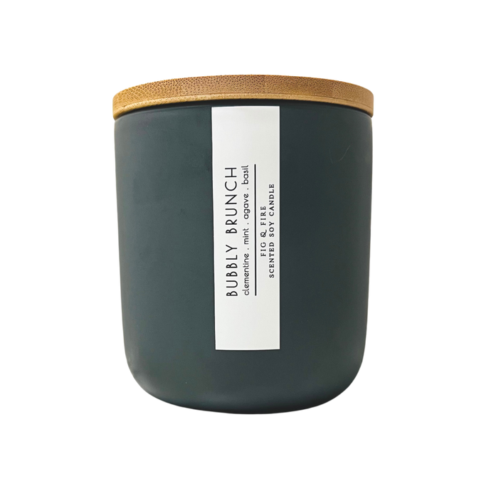Handcrafted candle - summer seasonal collection - scent is Blissful Berry - smells of clementine, mint, agave, and basil - all natural soy candle - vegan, non-toxic, made with essential oils - container is a charcoal ceramic tumbler with a bamboo wooden lid