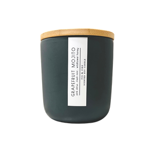 Handcrafted candle - scent is Grapefruit Mojito - smells of pink citrus, fresh mint, and wildflower honey - all natural soy candle - vegan, non-toxic, made with essential oils - container is a charcoal ceramic tumbler with a bamboo wooden lid