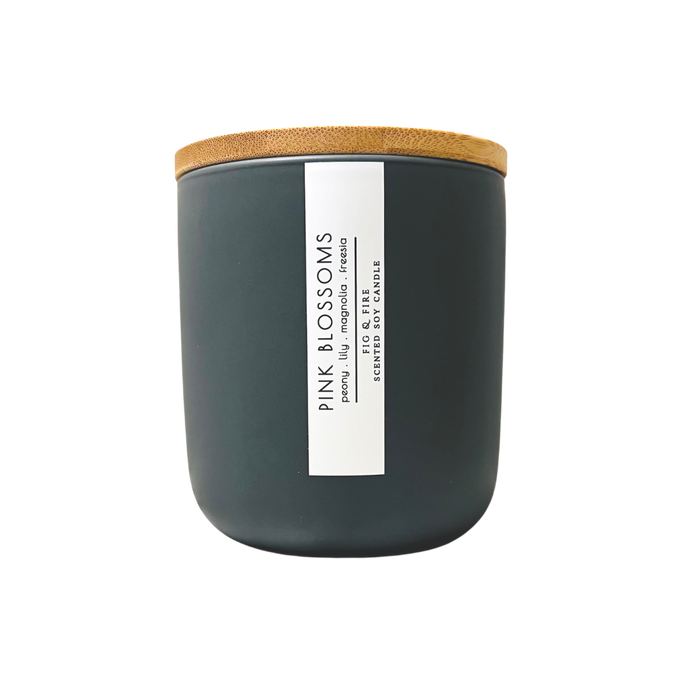 Handcrafted candle - scent is Pink Blossoms - smells of peony, lily, magnolia, and freesia - all natural soy candle - vegan, non-toxic, made with essential oils - container is a charcoal ceramic tumbler with a bamboo wooden lid