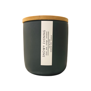 Handcrafted winter candle - scent is snowy evening - smells of clove, pine, orange, and cinnamon - all natural soy candle - vegan, non-toxic, made with essential oils - seasonal collection - container is a charcoal ceramic tumbler with a light brown bamboo wooden lid