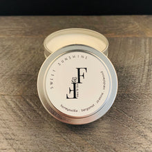 Load image into Gallery viewer, Handcrafted candle - scent is Sweet Sunshine - smells of honeysuckle, bergamot, jasmine, and sandalwood - all natural soy candle - vegan, non-toxic, made with essential oils - container is a silver tin