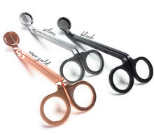 Load image into Gallery viewer, Wick trimmers are pictured in three colors: rose gold, silver, and black.